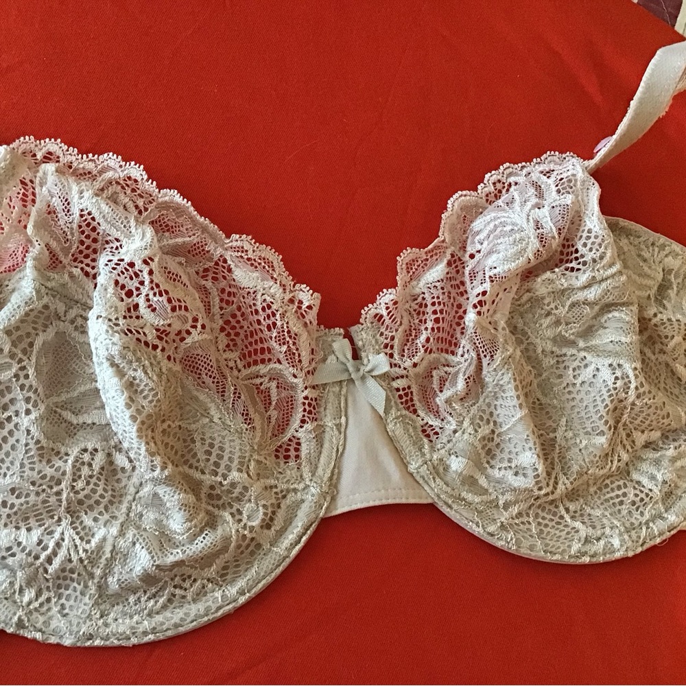 2 beige lace bras.